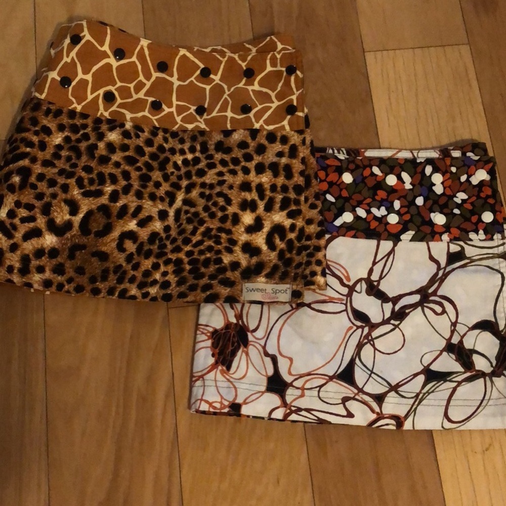 2 Sweet Spot Skirts. Reversible. Fits size 2 to 14.